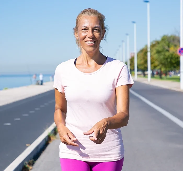Mature woman walking outdoors