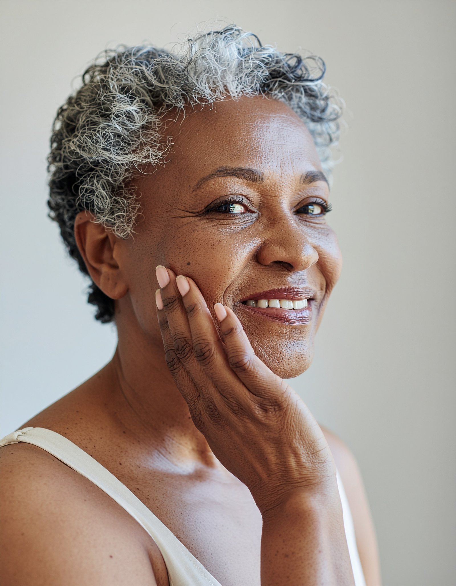 Mature Black American woman with radiant-looking skin